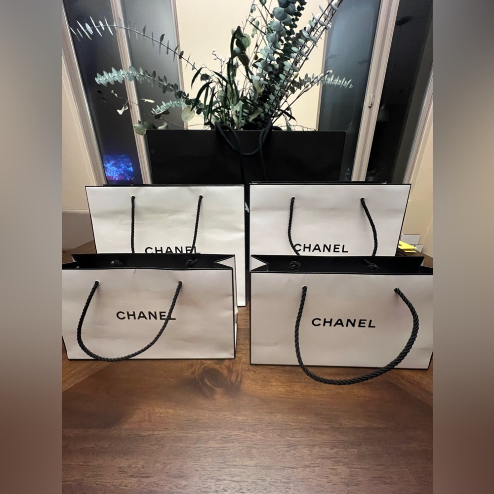 Chanel set of 4 white shopping bags